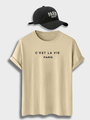 Zandkleurig shirt met zwarte pet